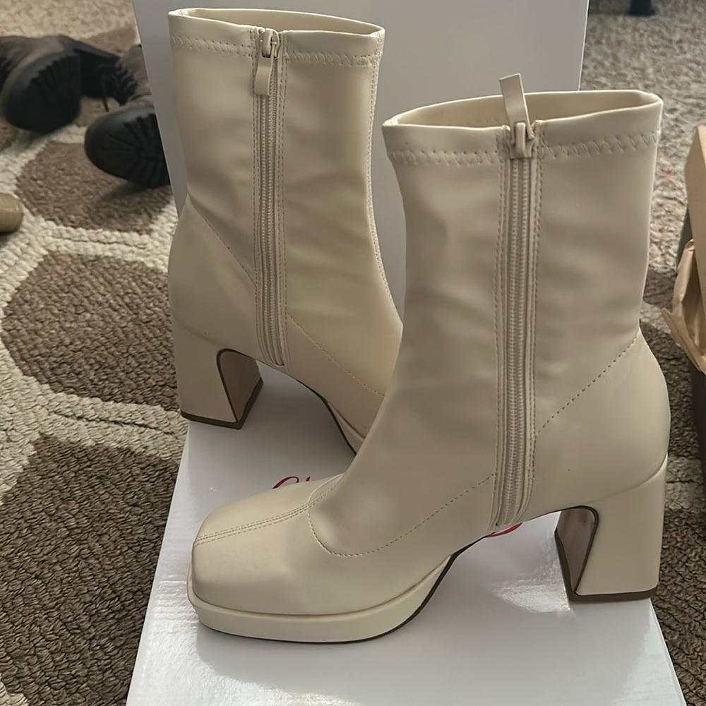 Cream booties never worn